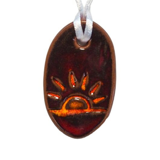 Vitalmedaillon-rot roter ovaler Anhänger aus Keramik mit aufgehender Sonne